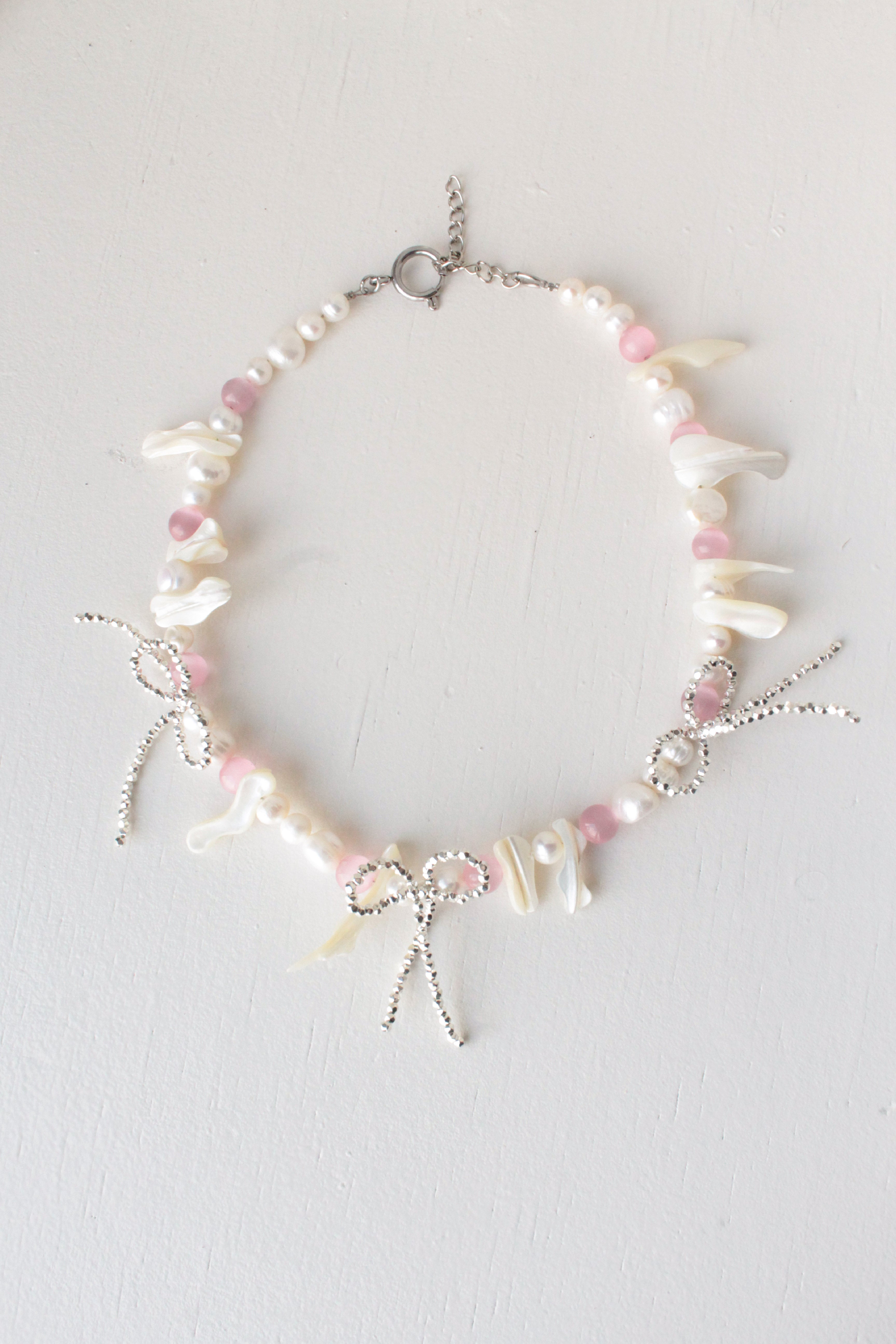 Naszyjnik perłowy z kokardkami